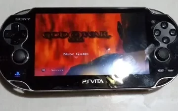 Ps vita en aliexpress con el juego GOD OF WAR , alidatos.com